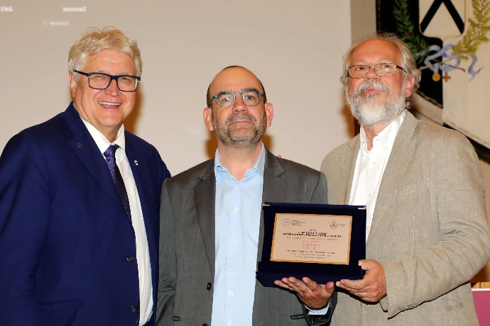 Alberto Felice De Toni, Mayor of Udine, stands beside Muhittin Mungan and Damien Vandembroucq during an award presentation ceremony in Udine Alberto Felice De Toni, Mayor of Udine, stands beside Muhittin Mungan and Damien Vandembroucq during an award presentation ceremony in Udine